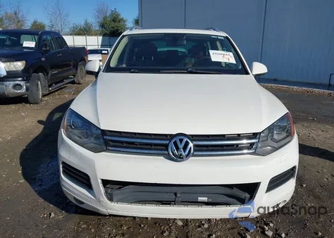 2011 Volkswagen Touareg Vr6 Lux z USA, uszkodzony, nr VIN WVGFF9BP6BD003726